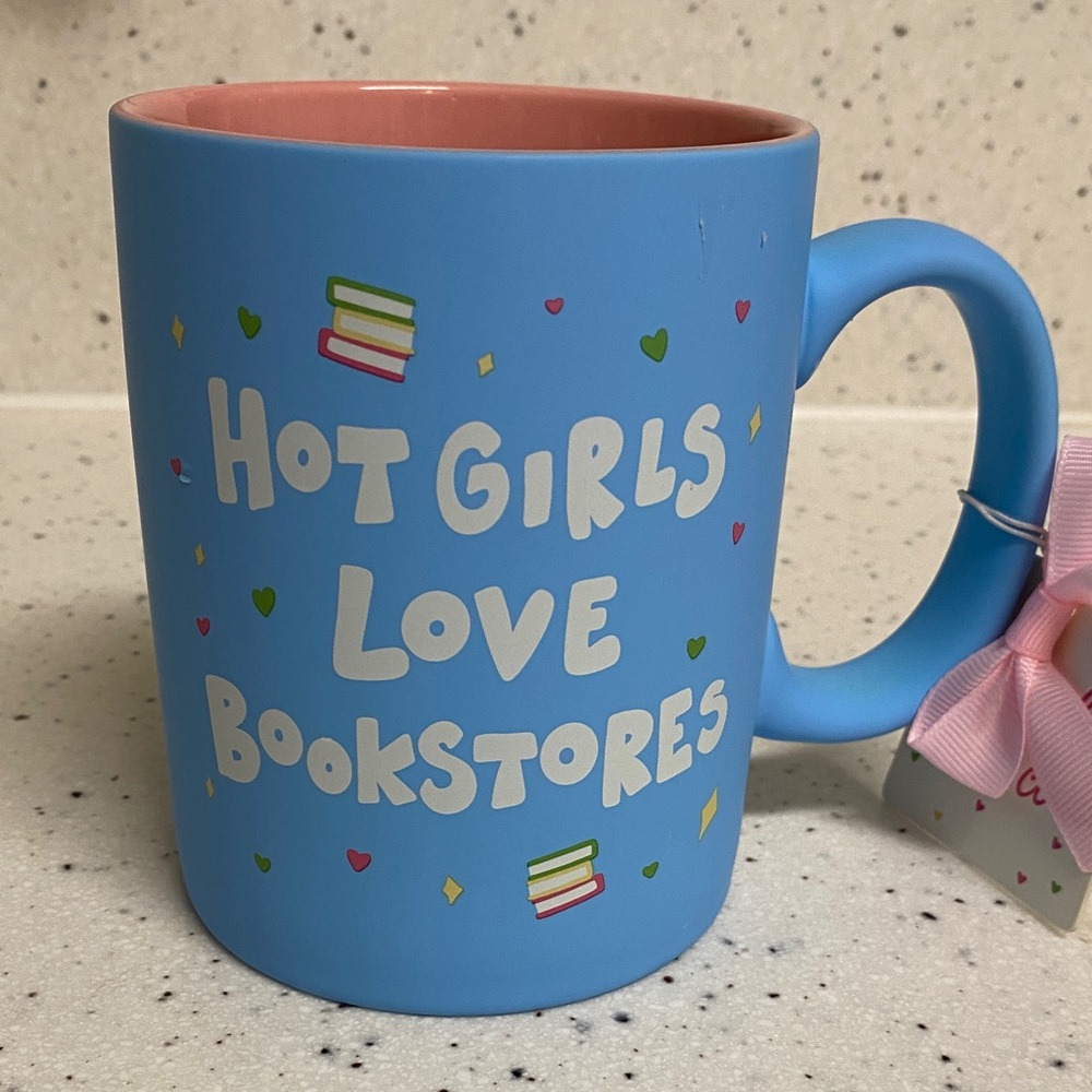 NWT.  Bull in a Bookshop, 20oz., ceramic mug.